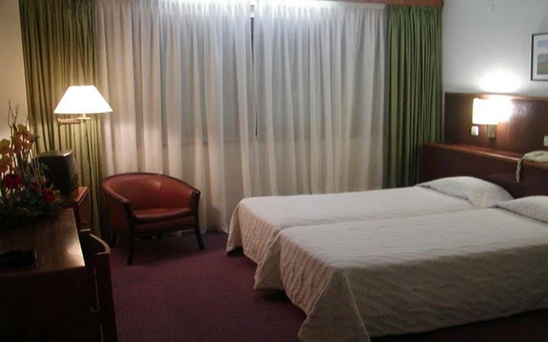 Luso Brasileiro Hotel โปโว เดอ วาร์ซิม ภายนอก รูปภาพ
